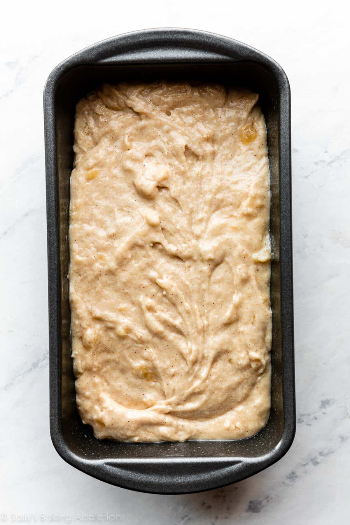 banana bread batter in baking pan